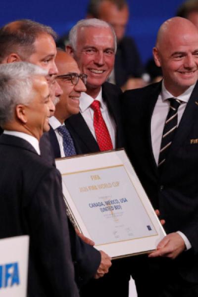 FIFA President Gianni Infantino poses for a picture with officials after the announcement, that the 2026 FIFA World Cup will be held in the United States, Mexico and Canada, during the 68th FIFA Congress in Moscow