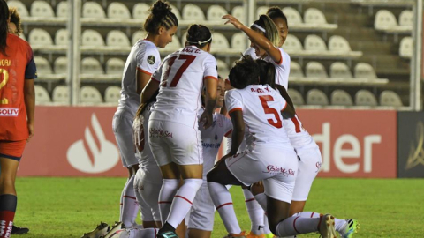 Las jugadoras de América de Cali festejan uno de los goles ante El Nacional, el lunes 8 de marzo de 2021.