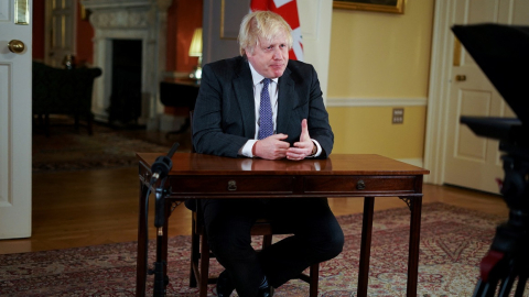 El primer ministro británico Boris Johnson en una rueda de prensa, sobre los casos de la variante ómicron, el 12 de diciembre de 2021.