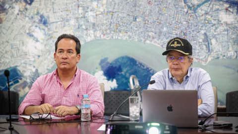 El ministro de Gobierno y el presidente Guillermo Lasso, en Guayaquil, el 18 de marzo de 2023.