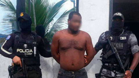 Alias 'Gordo' escoltado por agentes de la Policía Nacional.