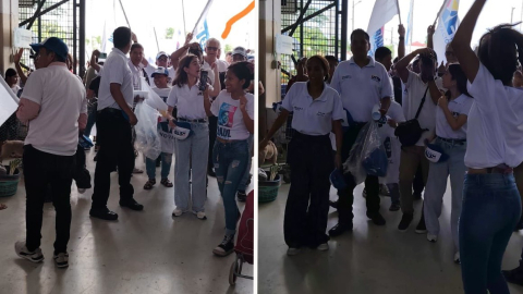 Simpatizantes del candidato a asambleísta por el movimiento RETO, Omar Maluk, hacen proselitismo en un mercado de Guayaquil, el 12 de enero del 2025.