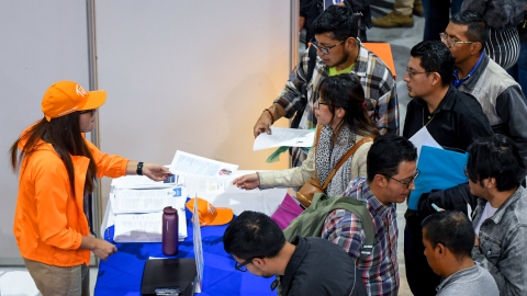 Fotografía de archivo de una feria de empleo organizada por ConQuito en julio de 2025.