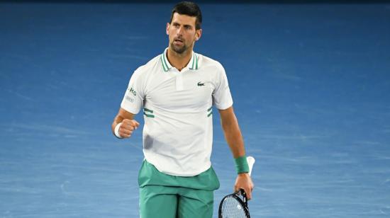 Novak Djokovic celebra su victoria ante Milos Raonic por los octavos de final del Abierto de Australia, el domingo 14 de febrero de 2021.