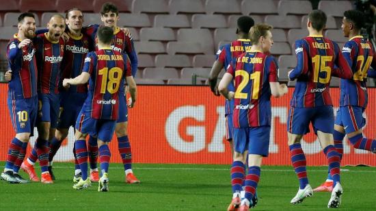 Los jugadores del Barcelona celebran en el partido ante Sevilla, el miércoles 3 de marzo de 2021, en España.