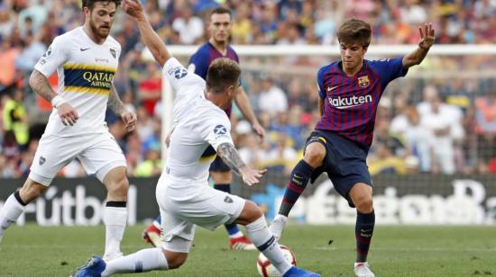 Jugadores del FC Barcelona y Boca Juniors, en el último partido que jugaron entre ambos, en el Camp Nou, el 15 de agosto de 2018.