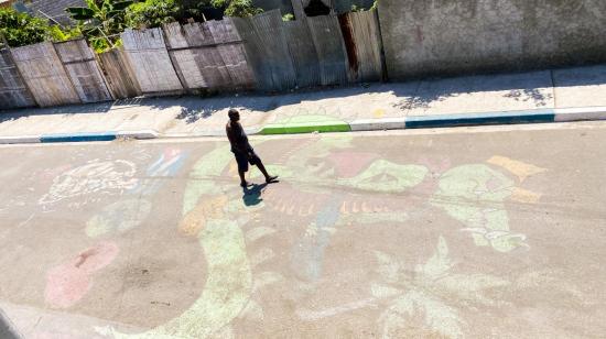 Calle del Guasmo Sur donde está pintado el símbolo que identifica a la banda de Los Lagartos. 
