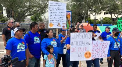 Trabajadores inmigrantes protestan contra la ley migratoria de Florida SB 1718, el 21 de junio de 2023, en Miami, Florida.