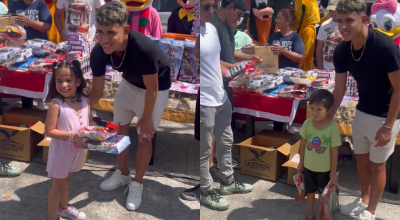 El jugador ecuatoriano, Kendry Paéz, entrega regalos de Navidad a niños.