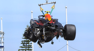 El auto de Checo Pérez es retirado de la pista del Gran Premio de Mónaco de F1, el 26 de mayo de 2024.