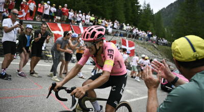 EF Education - EasyPost team's Ecuadorian rider Richard Carapaz cycles in the ascent Isola 2000 during the 19th stage of the 111th edition of the Tour de France cycling race, 144,6 km between Embrun and Isola 2000, in the French Alps, on July 19, 2024. (Photo by Marco BERTORELLO / AFP)